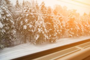 Beautiful,Snow-covered,Forest,Is,Visible,From,The,Window,Of,A